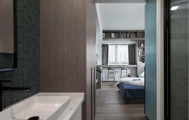 酒店公寓裝修效果圖(35㎡酒店式開間單身公寓，半平米都沒浪費，還裝得很有檔次)(圖2)